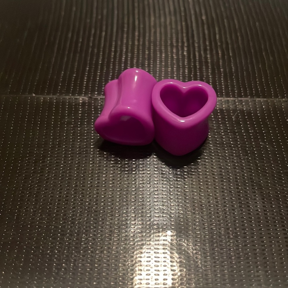 Purple tunnel heart plugs